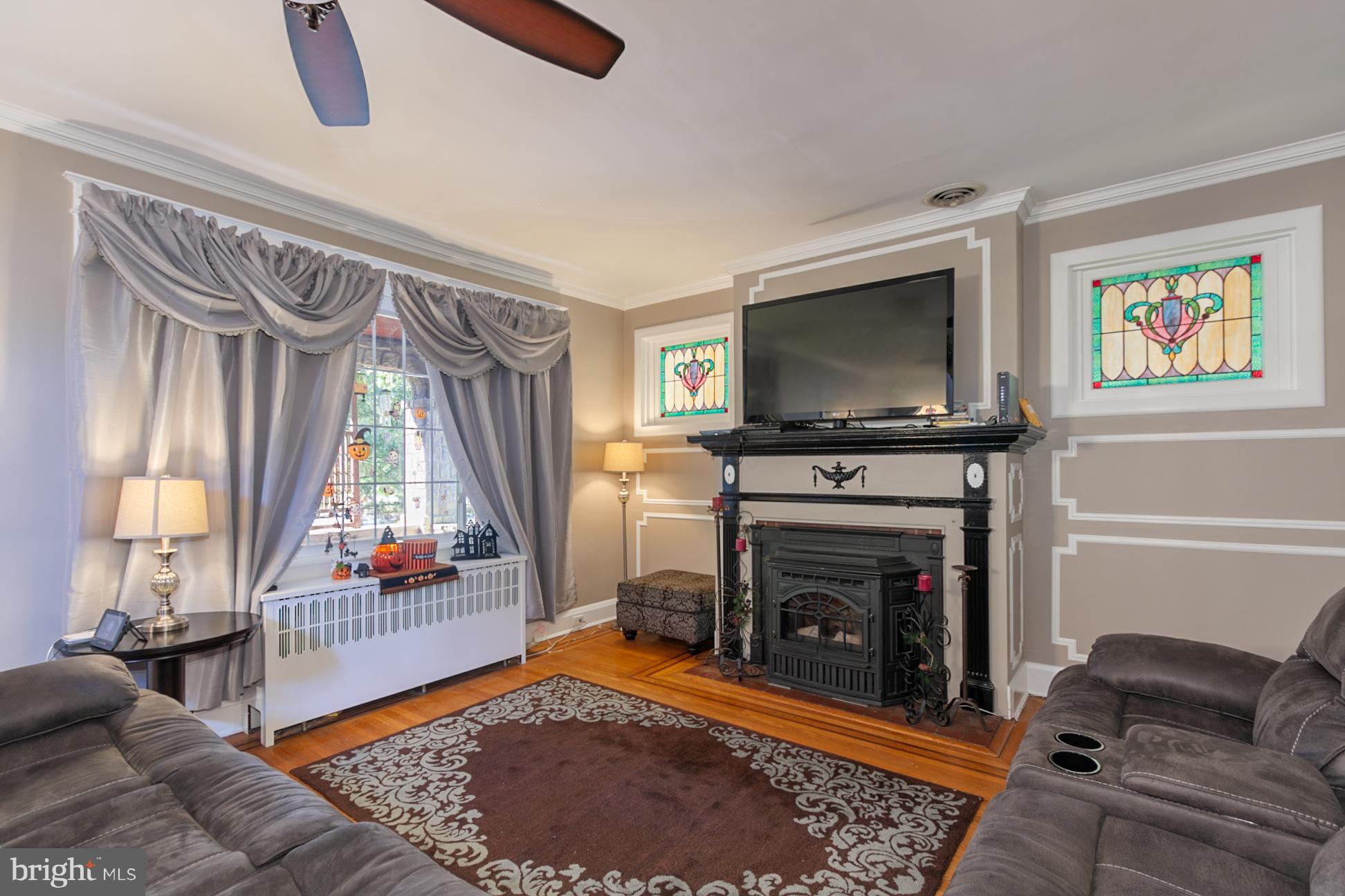 3200 Beverly Road Baltimore, MD 21214 - Photo 4 of 30 Pellet Stove & Original Stained Glass Windows