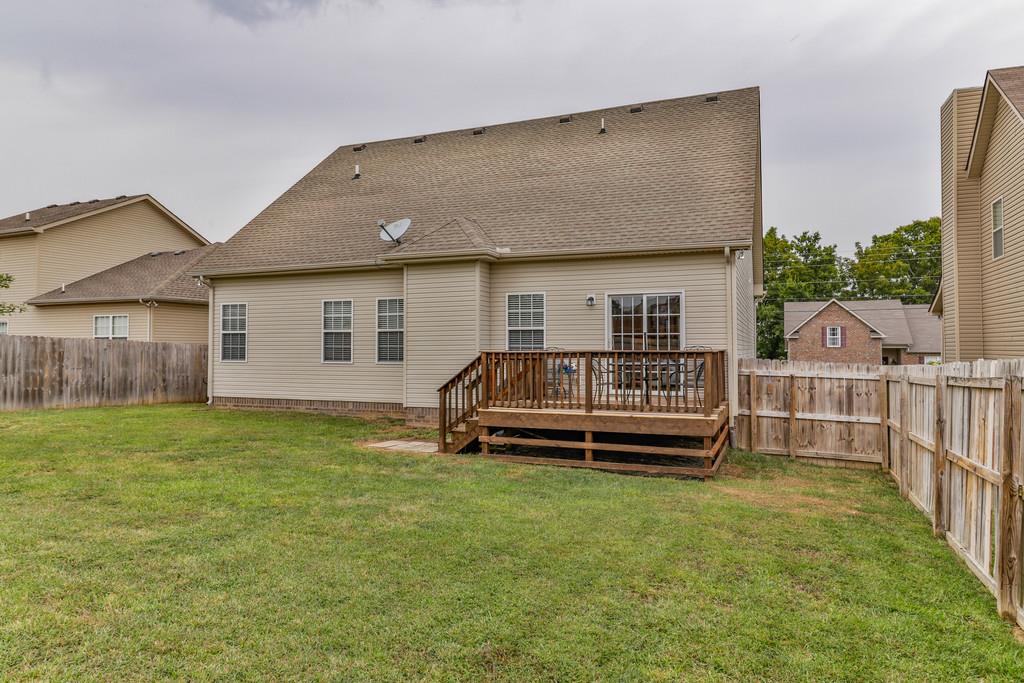 1045 Golf View Way Spring Hill, TN 37174 - Photo 24 of 26 a view of a house with backyard and porch