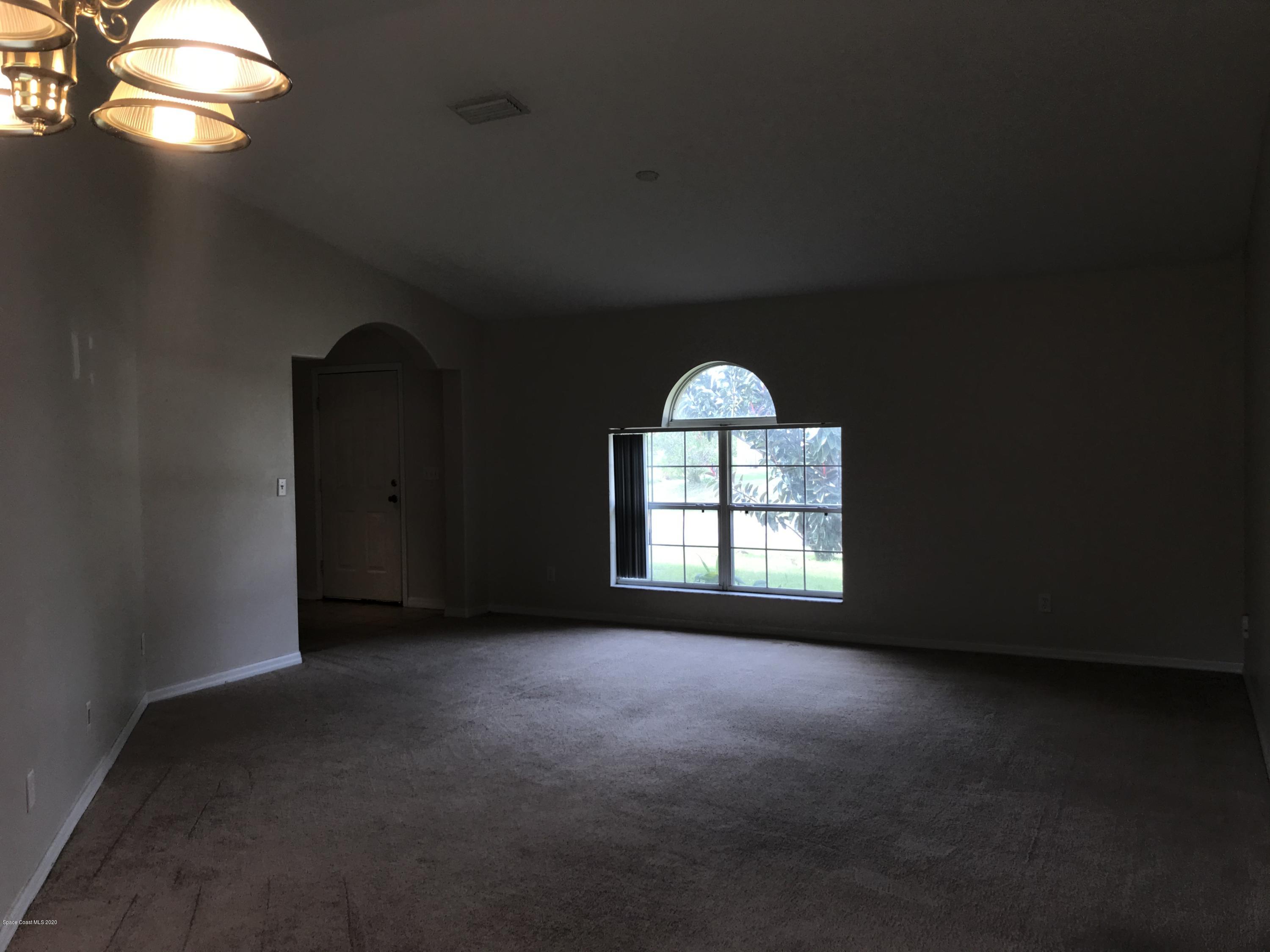 524 Titan Road Southeast Palm Bay, FL 32909 - Photo 11 of 18 a view of empty room with window