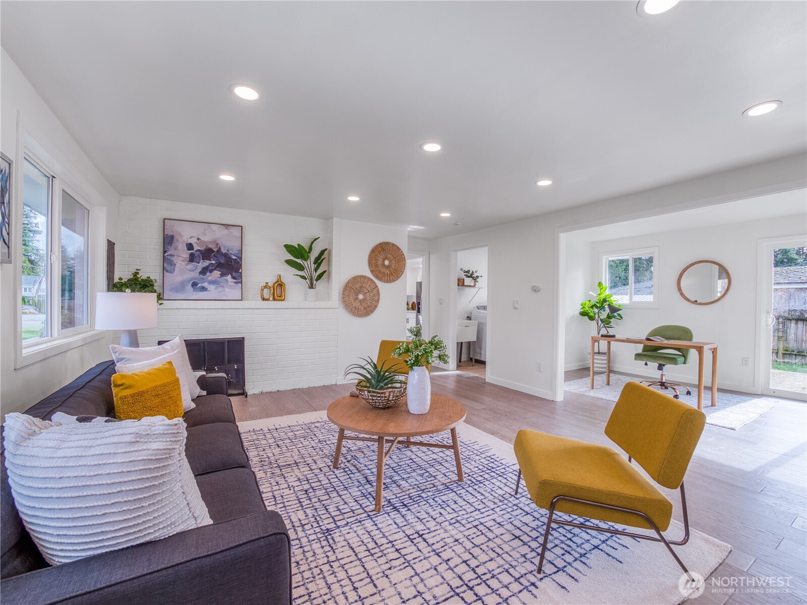 18 232nd Place Southwest Bothell, WA 98021 - Photo 12 of 32 a living room with furniture and wooden floor