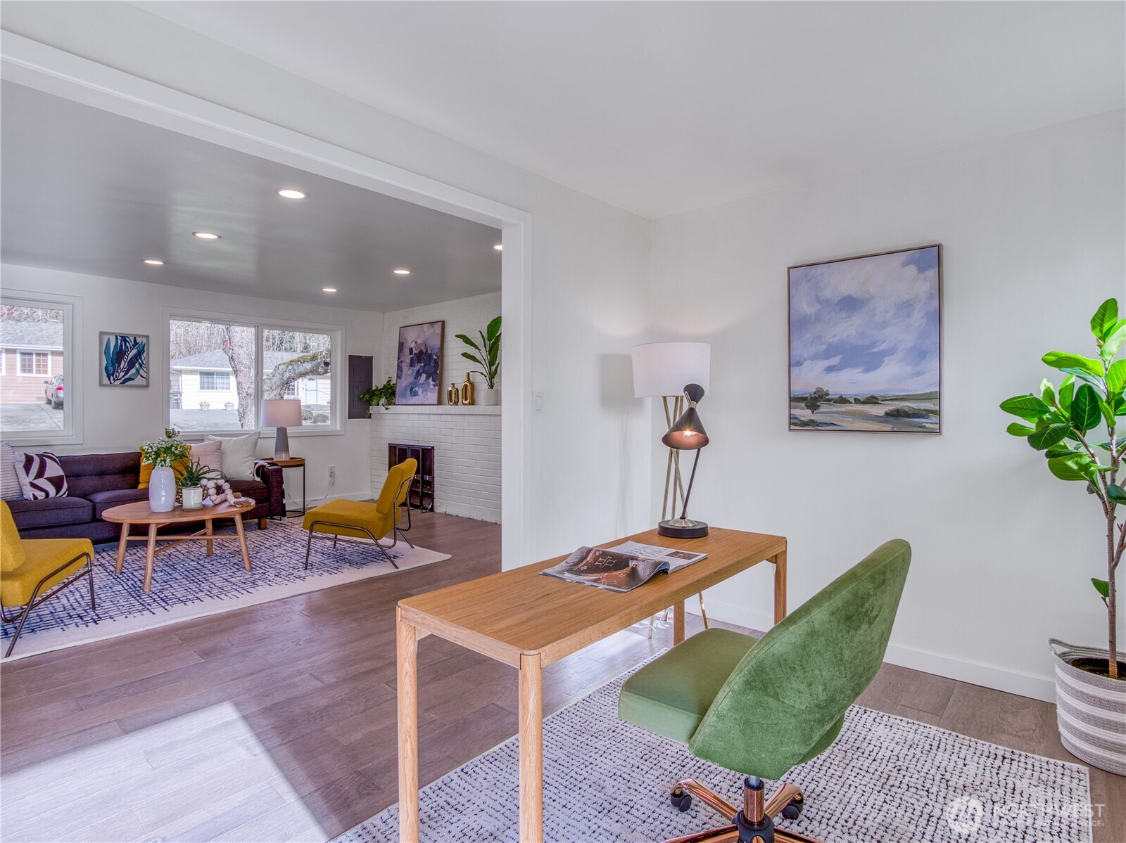 18 232nd Place Southwest Bothell, WA 98021 - Photo 16 of 32 a living room with furniture and a wooden floor
