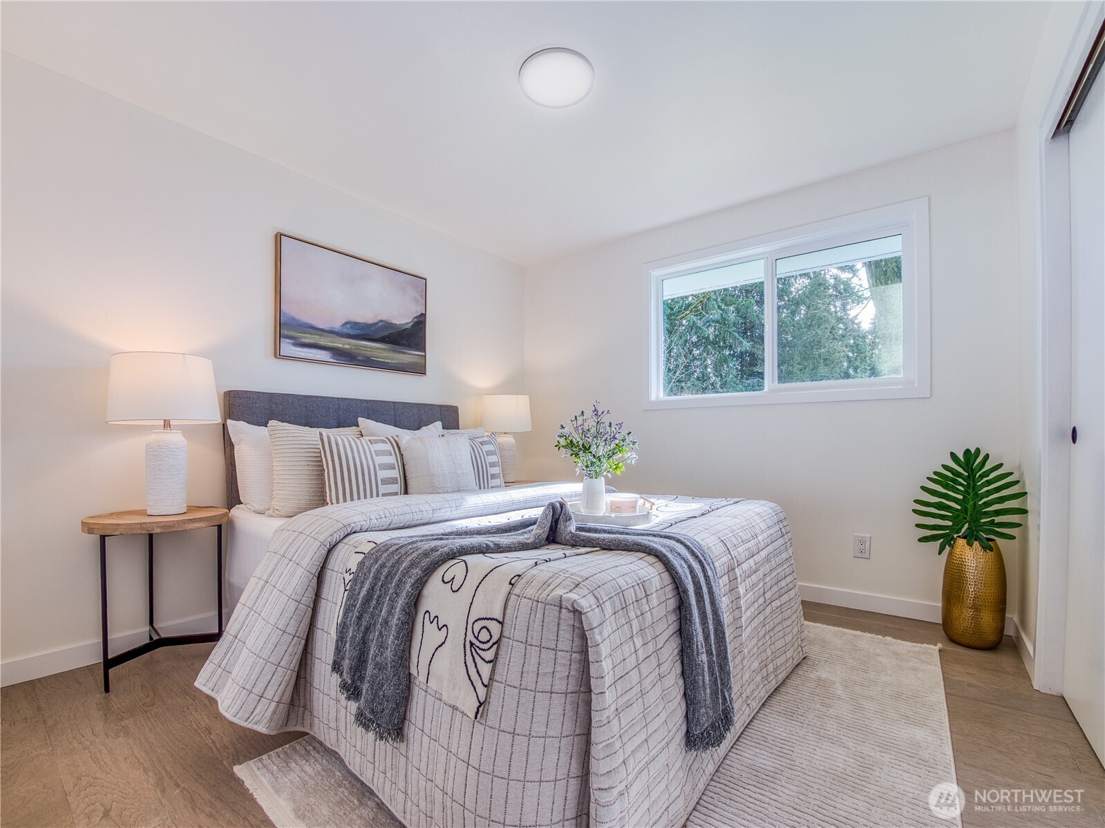 18 232nd Place Southwest Bothell, WA 98021 - Photo 17 of 32 a bedroom with bed and a couch