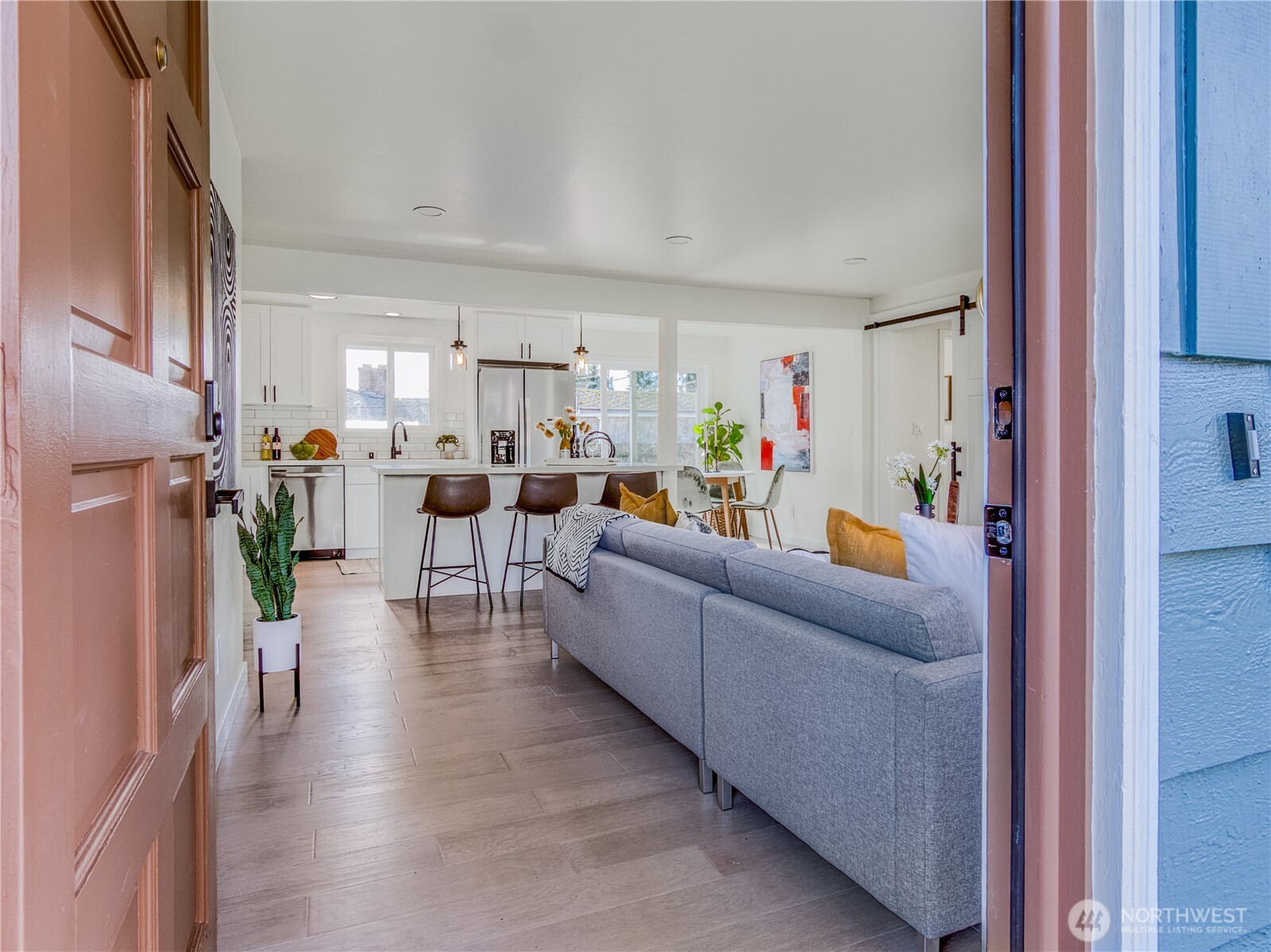 18 232nd Place Southwest Bothell, WA 98021 - Photo 2 of 32 a living room with furniture and a wooden floor