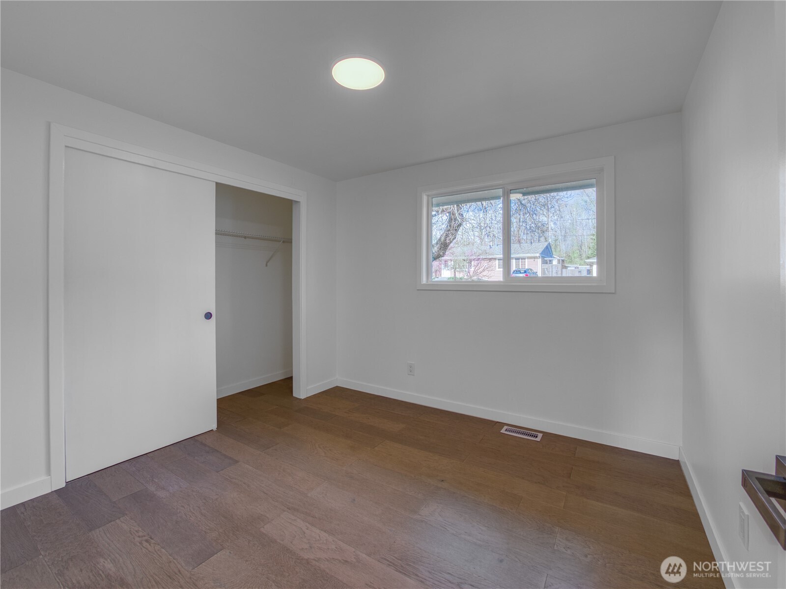 18 232nd Place Southwest Bothell, WA 98021 - Photo 22 of 32 an empty room with windows