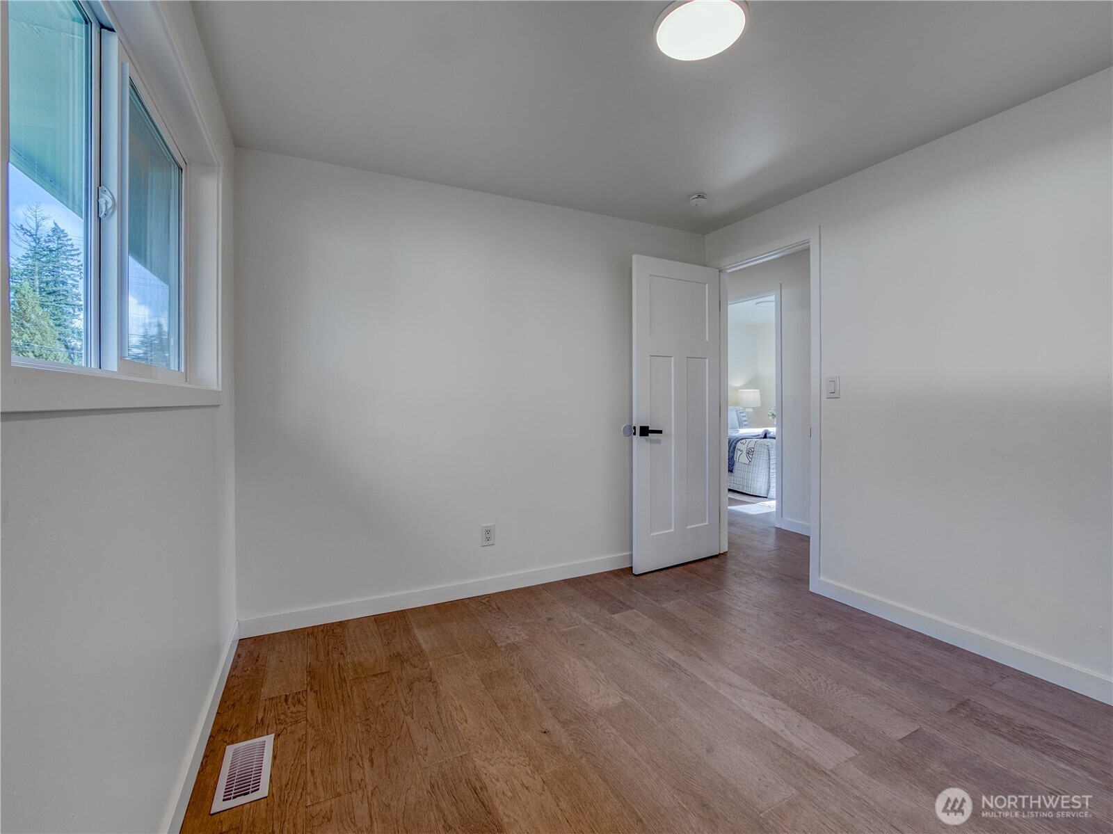 18 232nd Place Southwest Bothell, WA 98021 - Photo 23 of 32 a view of an empty room and window