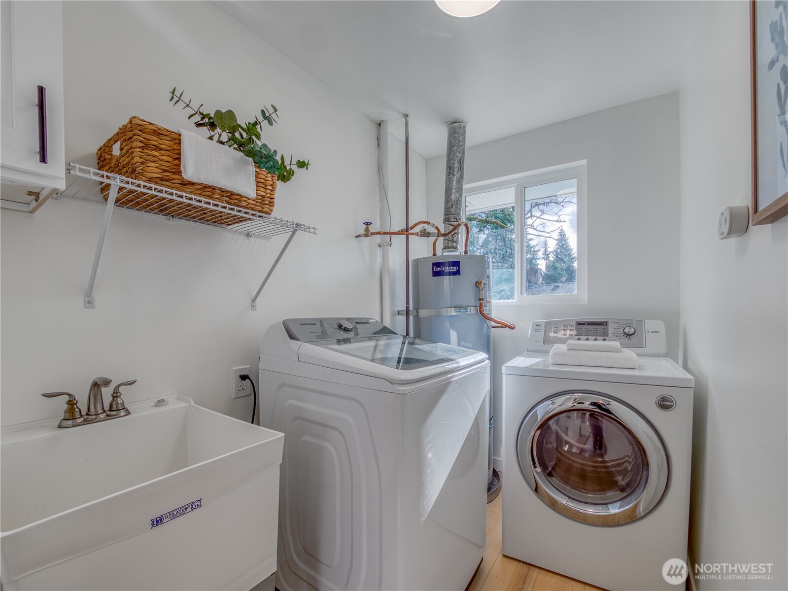 18 232nd Place Southwest Bothell, WA 98021 - Photo 25 of 32 a utility room with dryer and washer