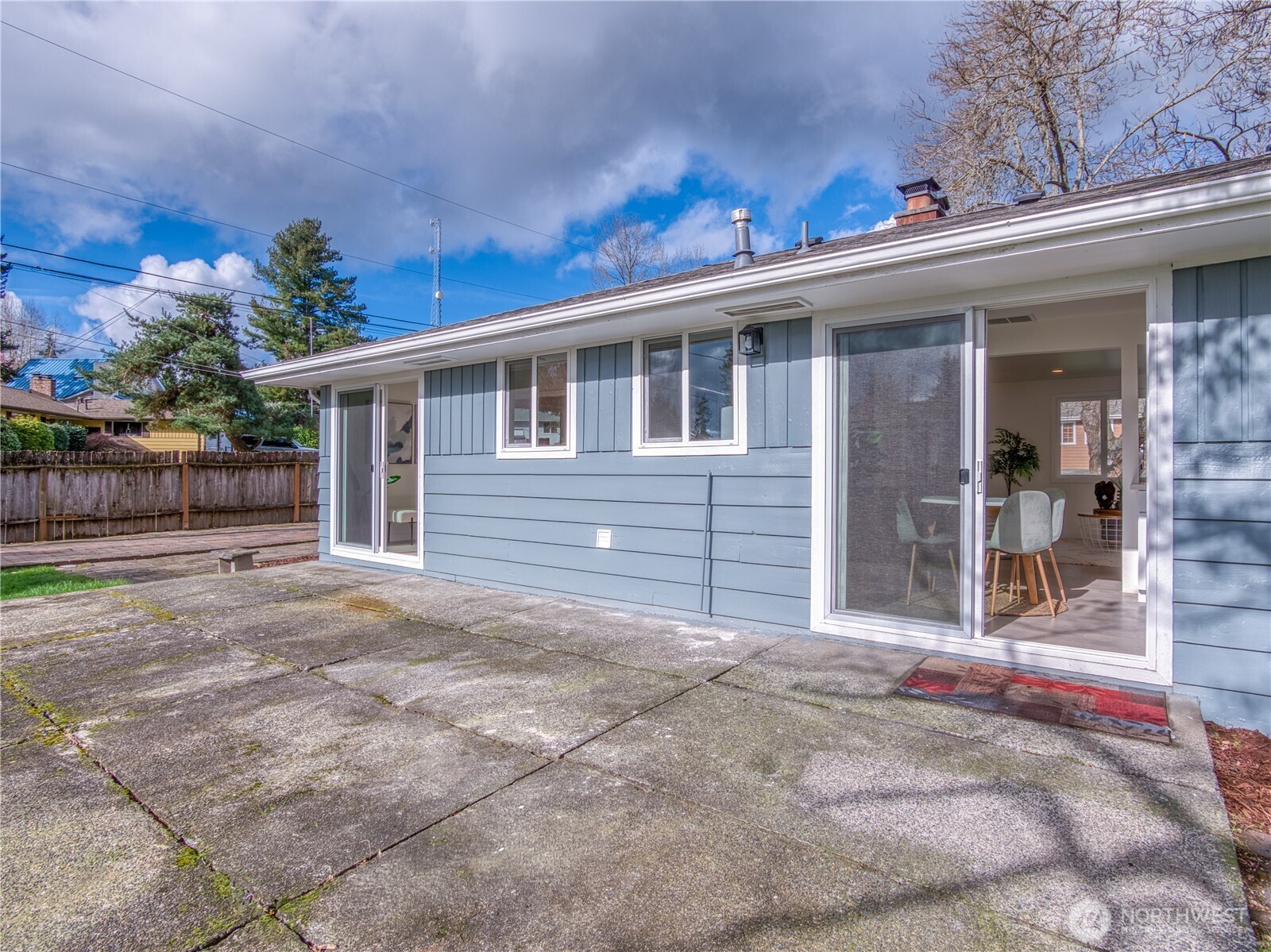 18 232nd Place Southwest Bothell, WA 98021 - Photo 27 of 32 a view of a house with a yard and potted plants