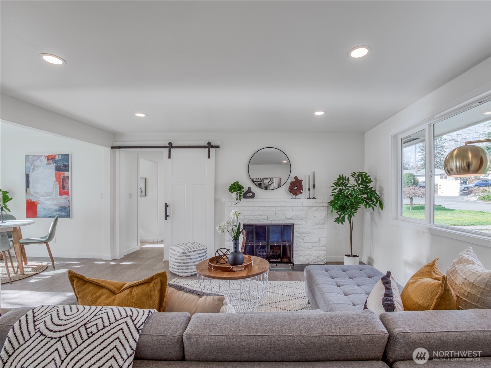 18 232nd Place Southwest Bothell, WA 98021 - Photo 5 of 32 a living room with furniture and a fireplace
