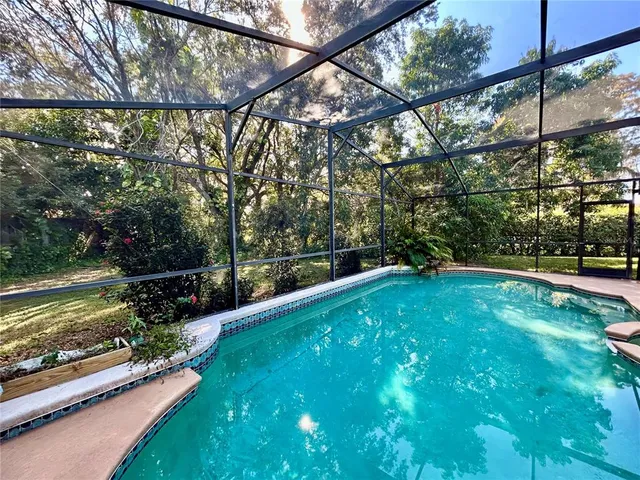 a view of a yard with a patio