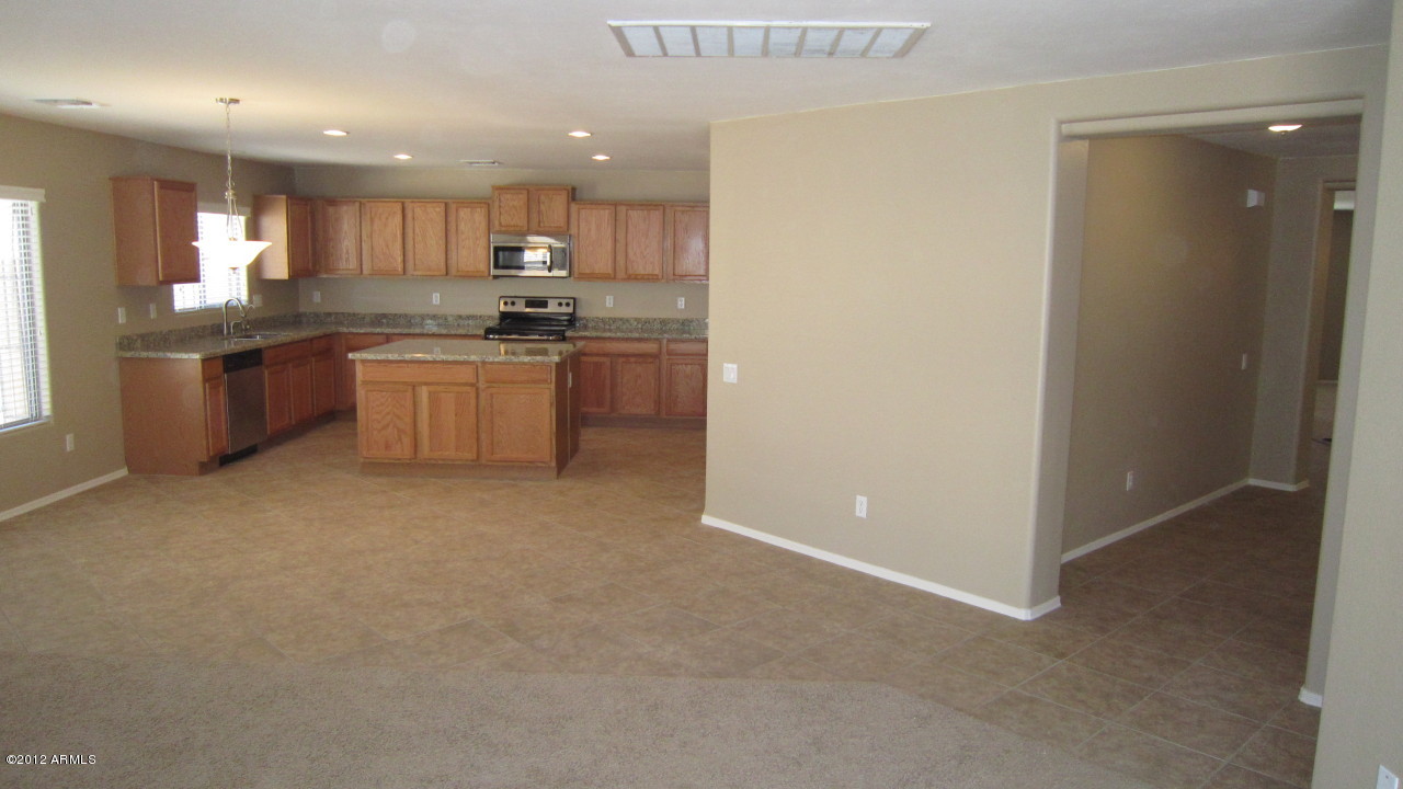 43418 West Magnolia Road Maricopa, AZ 85138 - Photo 13 of 50 kitchen from family room