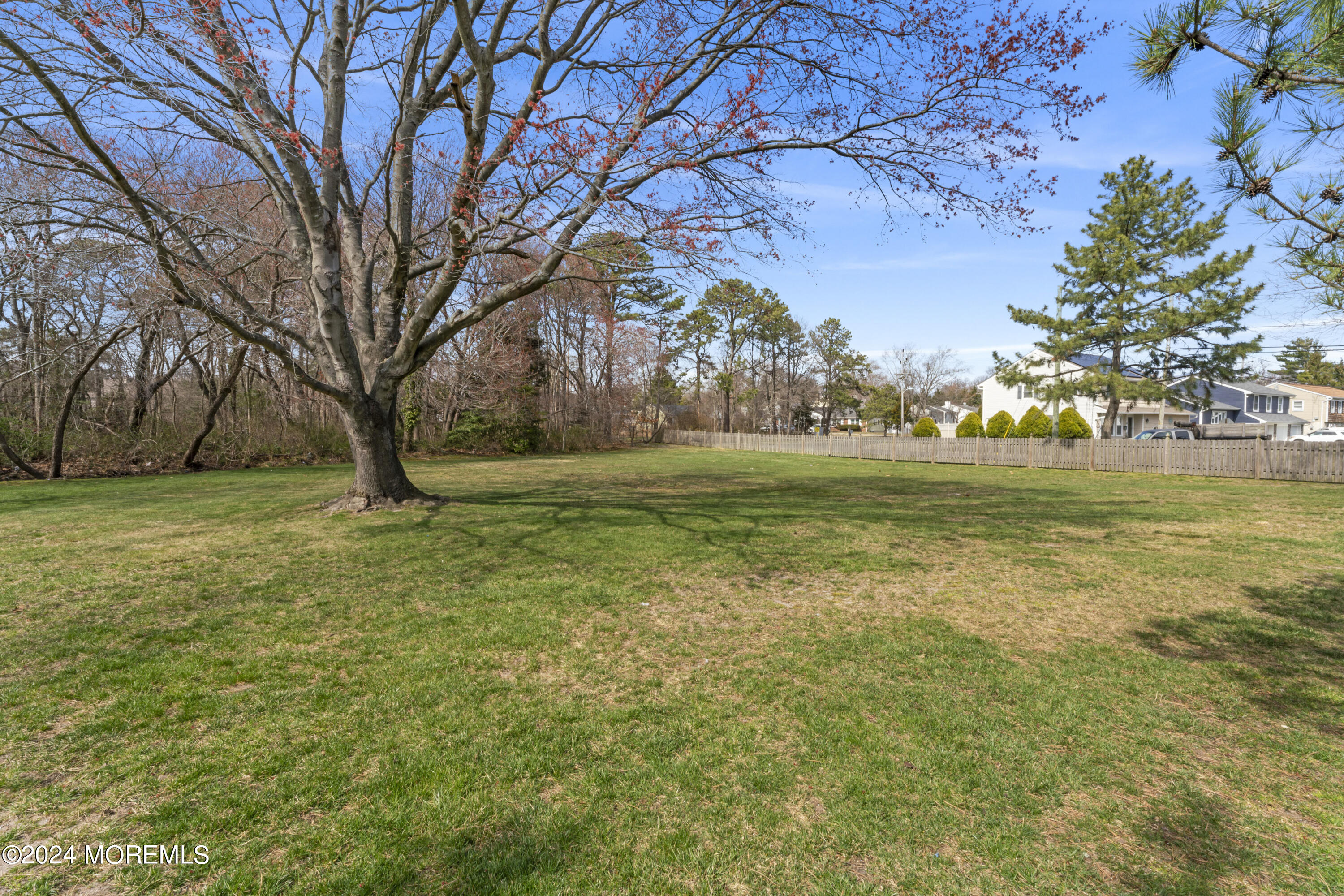 601 Mistletoe Avenue, Unit 4 Point Pleasant, NJ 08742 - Photo 12 of 28 a view of a field with an trees