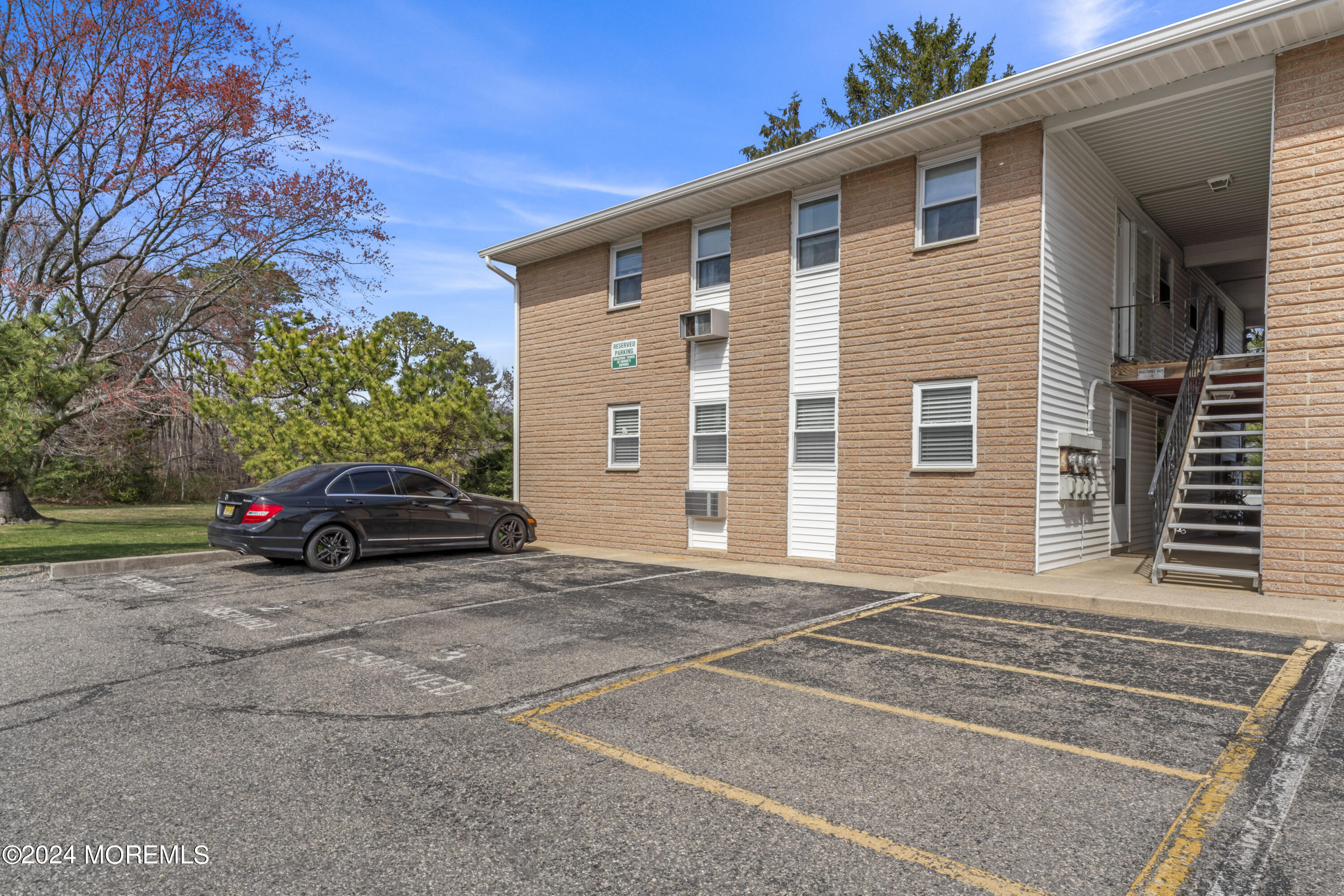 601 Mistletoe Avenue, Unit 4 Point Pleasant, NJ 08742 - Photo 13 of 28 a car parked in front of a house