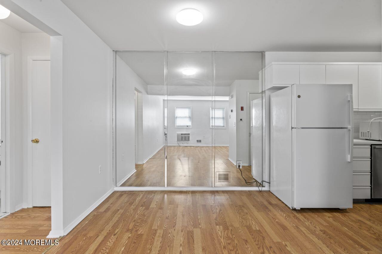 601 Mistletoe Avenue, Unit 4 Point Pleasant, NJ 08742 - Photo 19 of 28 a view of entryway with wooden floor