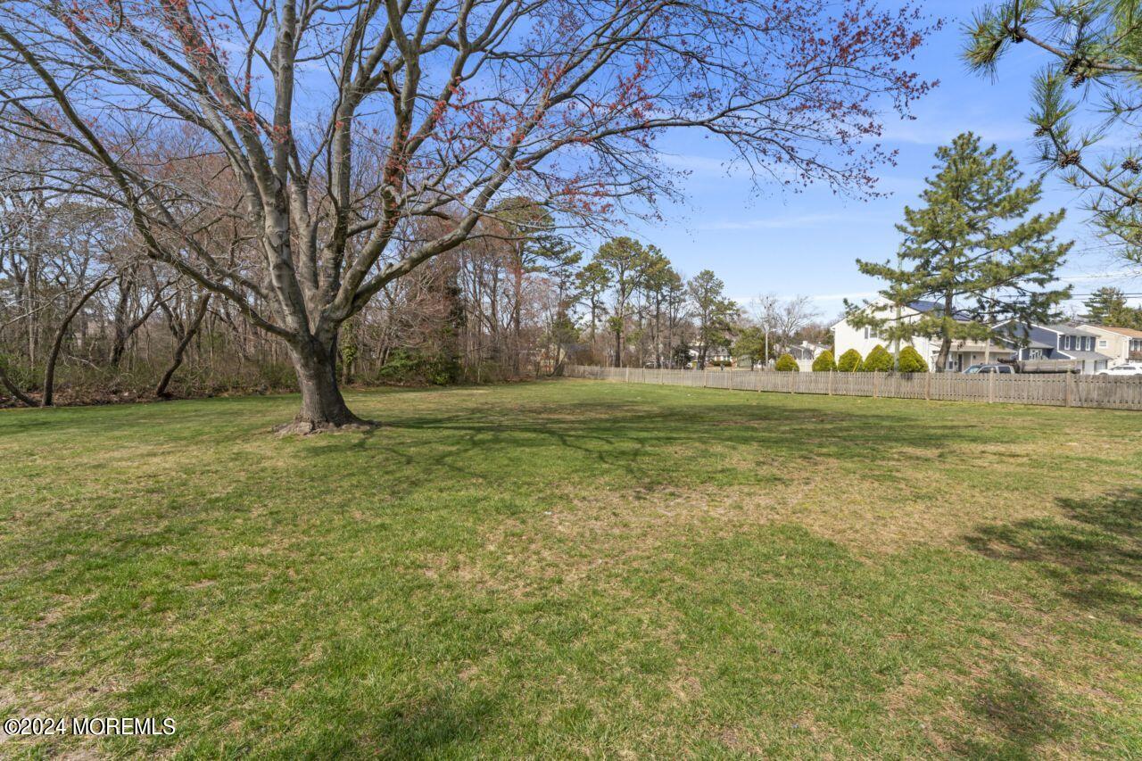 601 Mistletoe Avenue, Unit 4 Point Pleasant, NJ 08742 - Photo 25 of 28 a view of a field with an trees