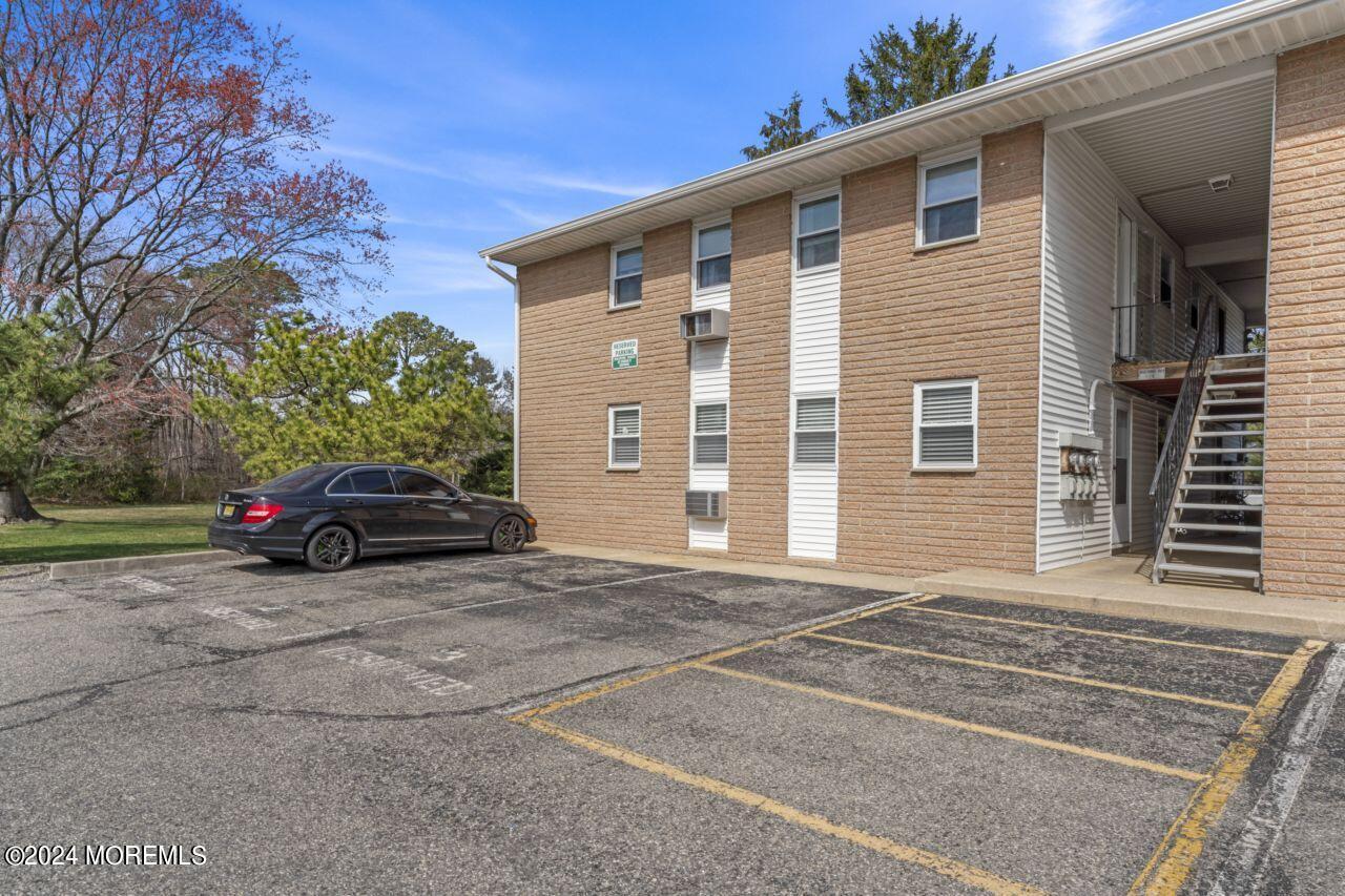 601 Mistletoe Avenue, Unit 4 Point Pleasant, NJ 08742 - Photo 27 of 28 a car parked in front of a house