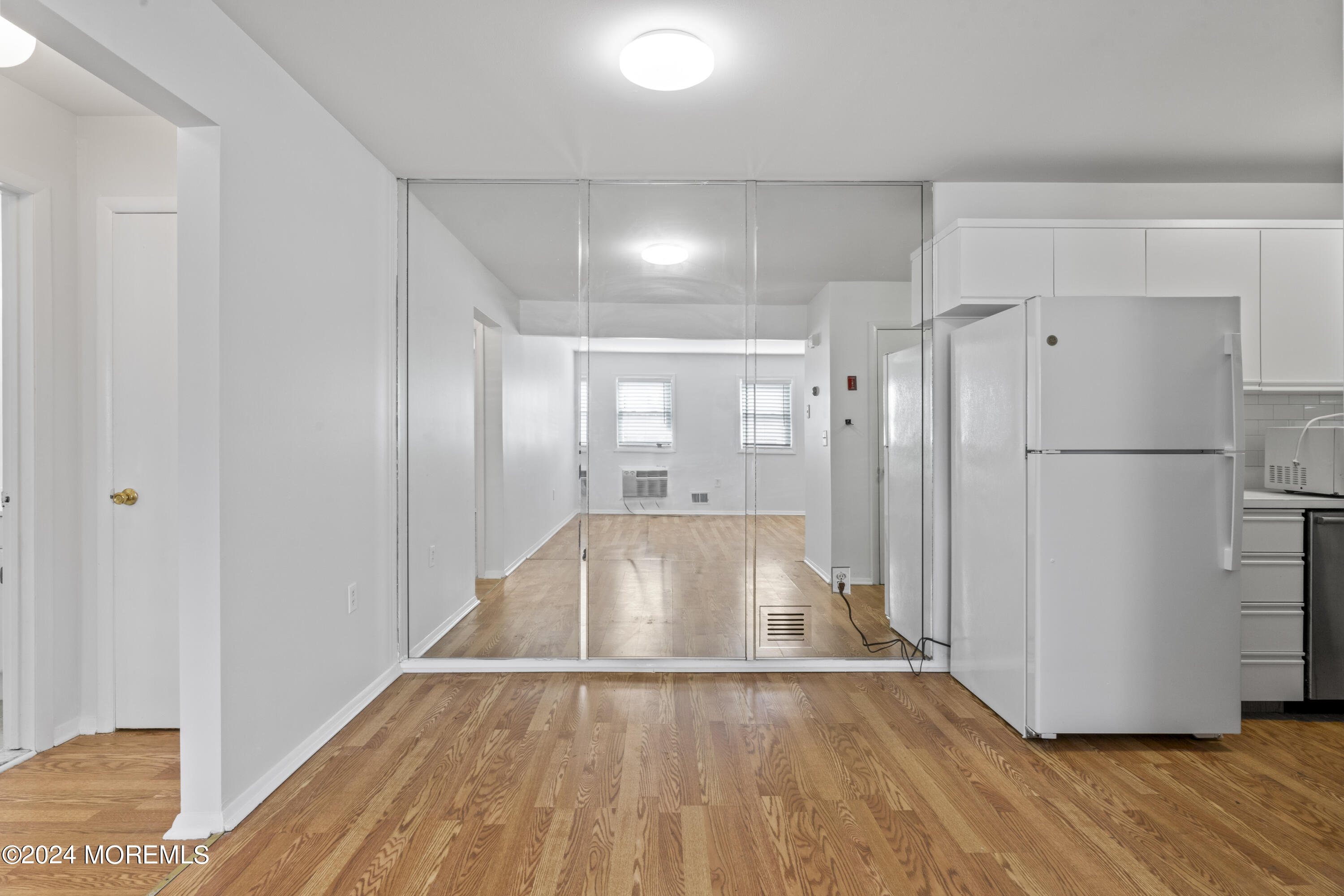 601 Mistletoe Avenue, Unit 4 Point Pleasant, NJ 08742 - Photo 6 of 28 a view of entryway with wooden floor