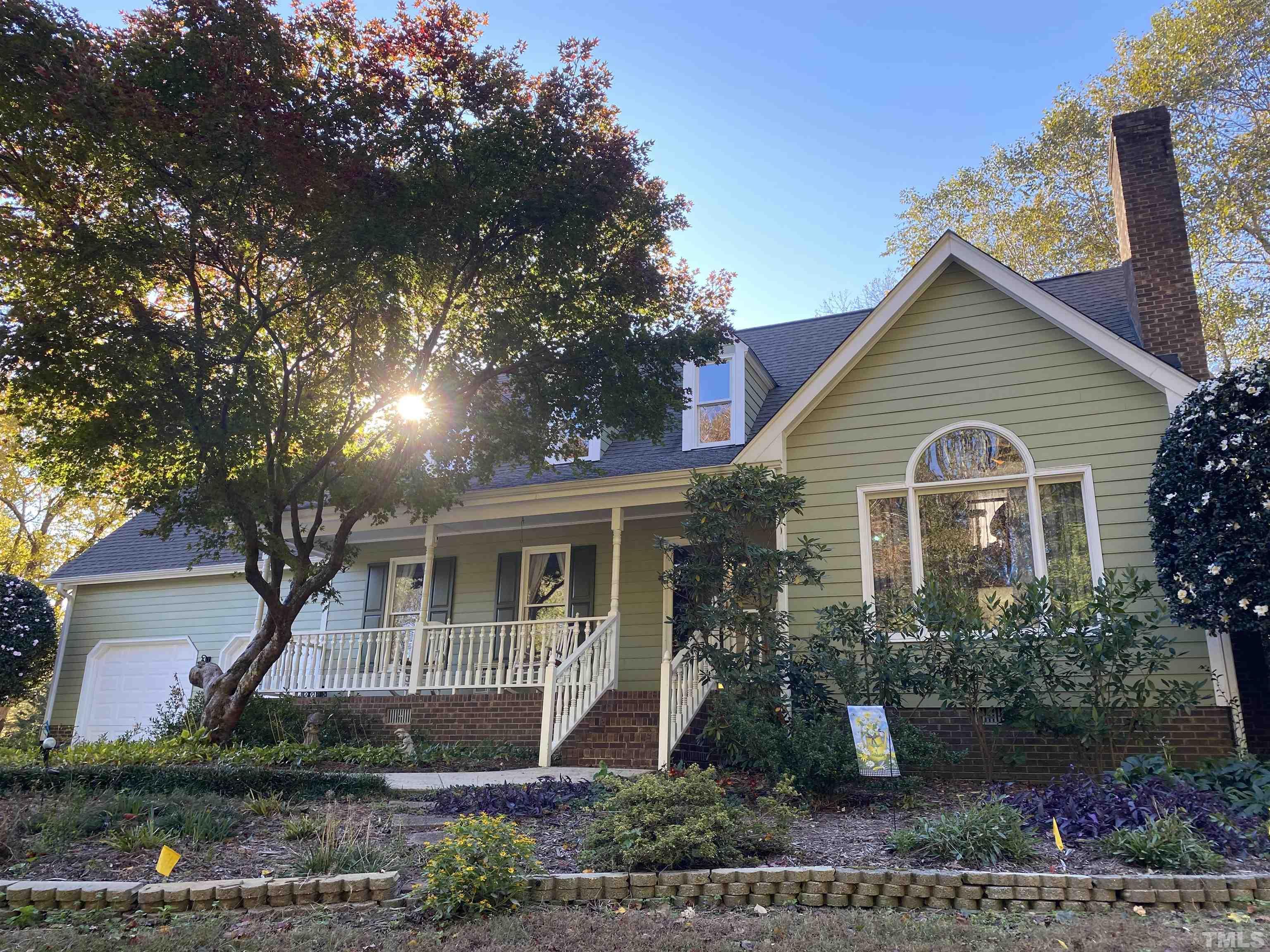924 Windrow Lane Raleigh, NC 27603 - Photo 1 of 26 a front view of a house with a yard