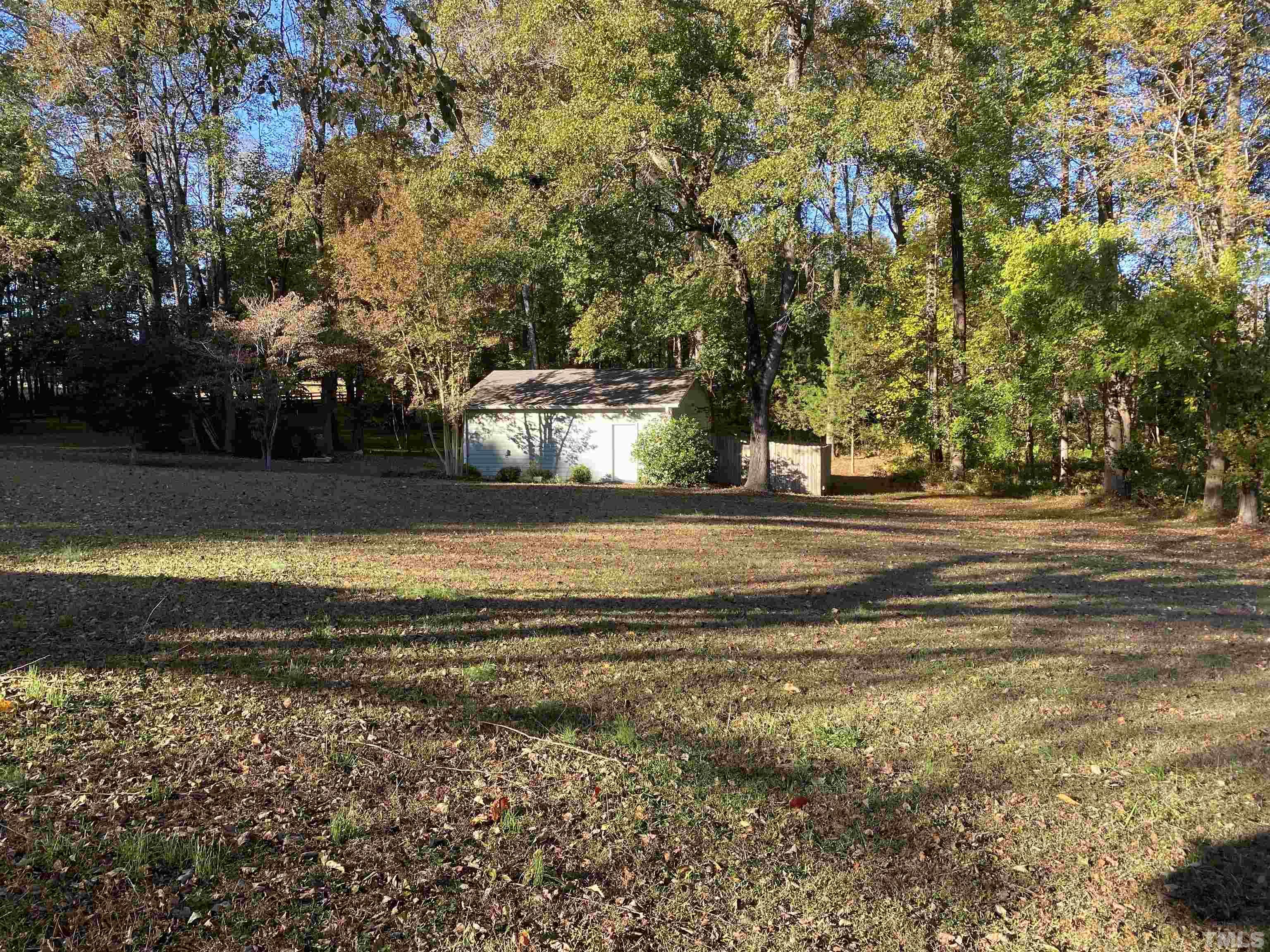 924 Windrow Lane Raleigh, NC 27603 - Photo 9 of 26 a view of a house with a yard