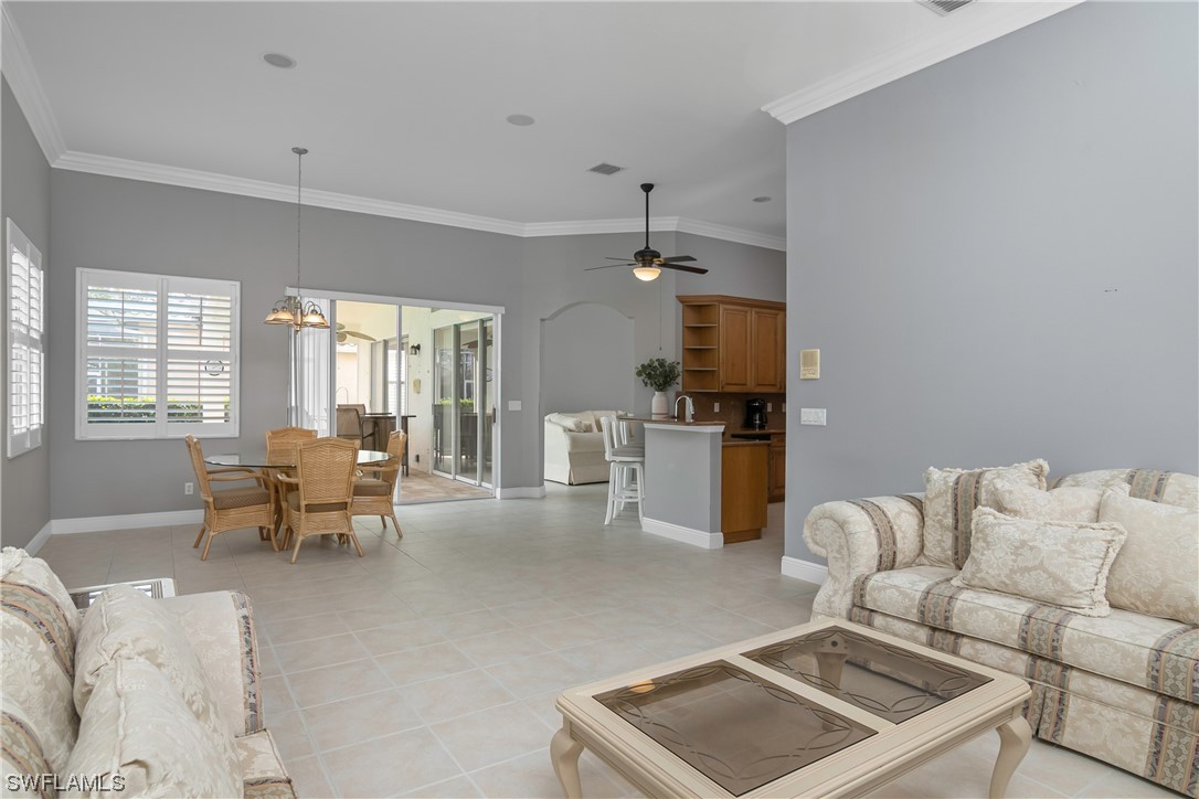 9057 Whitfield Drive Estero, FL 33928 - Photo 12 of 28 a living room with furniture