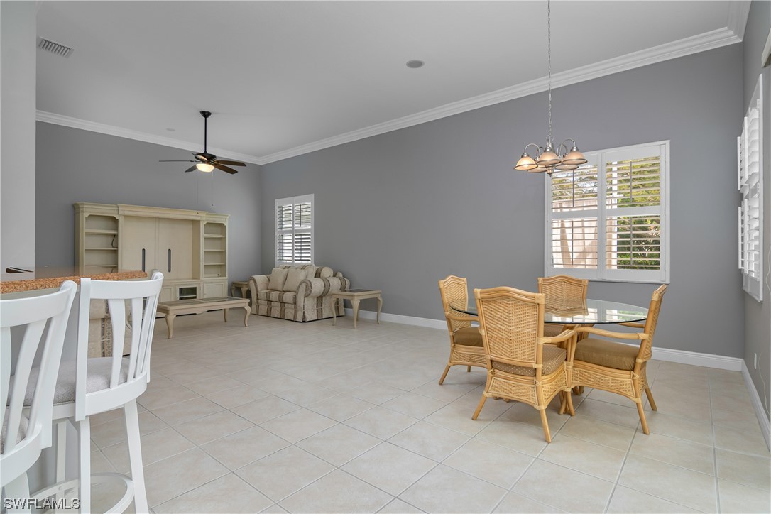 9057 Whitfield Drive Estero, FL 33928 - Photo 13 of 28 a view of a livingroom with furniture and a window