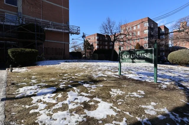 a view of a street with parking