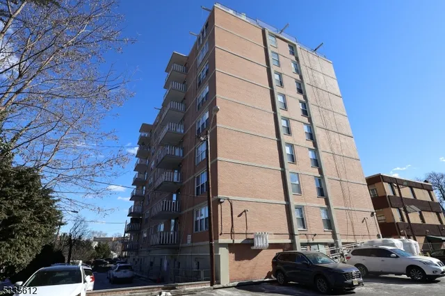 a city street lined with tall buildings