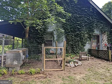 a backyard of a house with lots of green space
