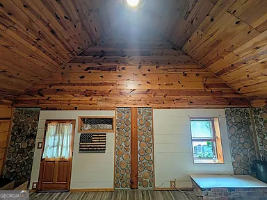 305 Cottonton Road Pittsview, AL 36871 - Photo 5 of 28 a view of a room with wooden walls