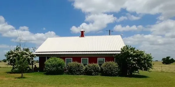 a house view with a garden space