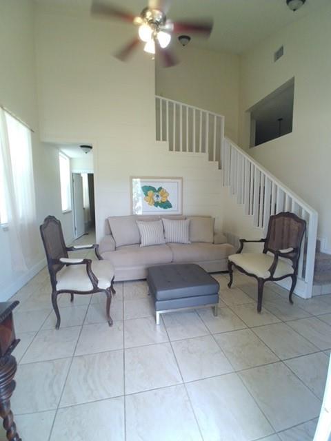 2670 Canaan Church Road Crawford, TX 76638 - Photo 8 of 17 a living room with furniture and a chandelier