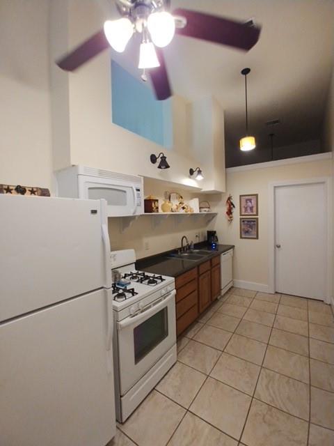 2670 Canaan Church Road Crawford, TX 76638 - Photo 10 of 17 a kitchen with stainless steel appliances granite countertop a stove a refrigerator and a stove
