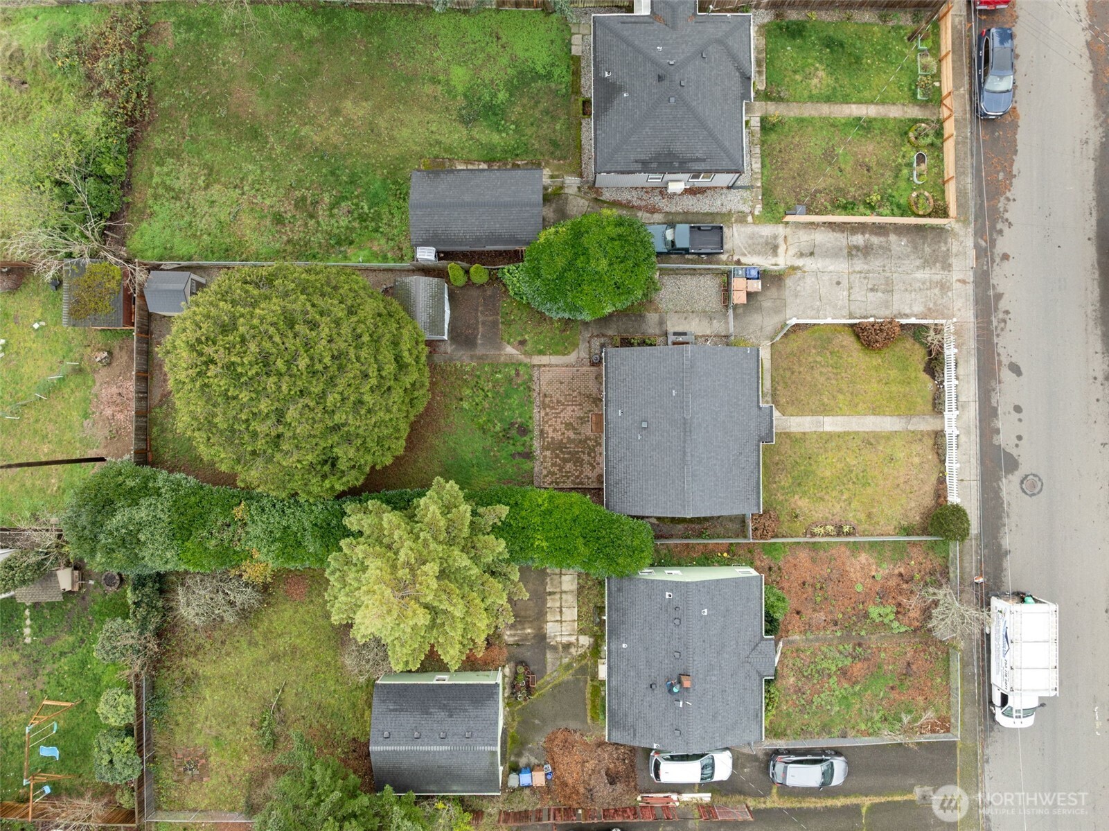 1027 South Rochester Street Tacoma, WA 98465 - Photo 26 of 29 an aerial view of residential houses with outdoor space