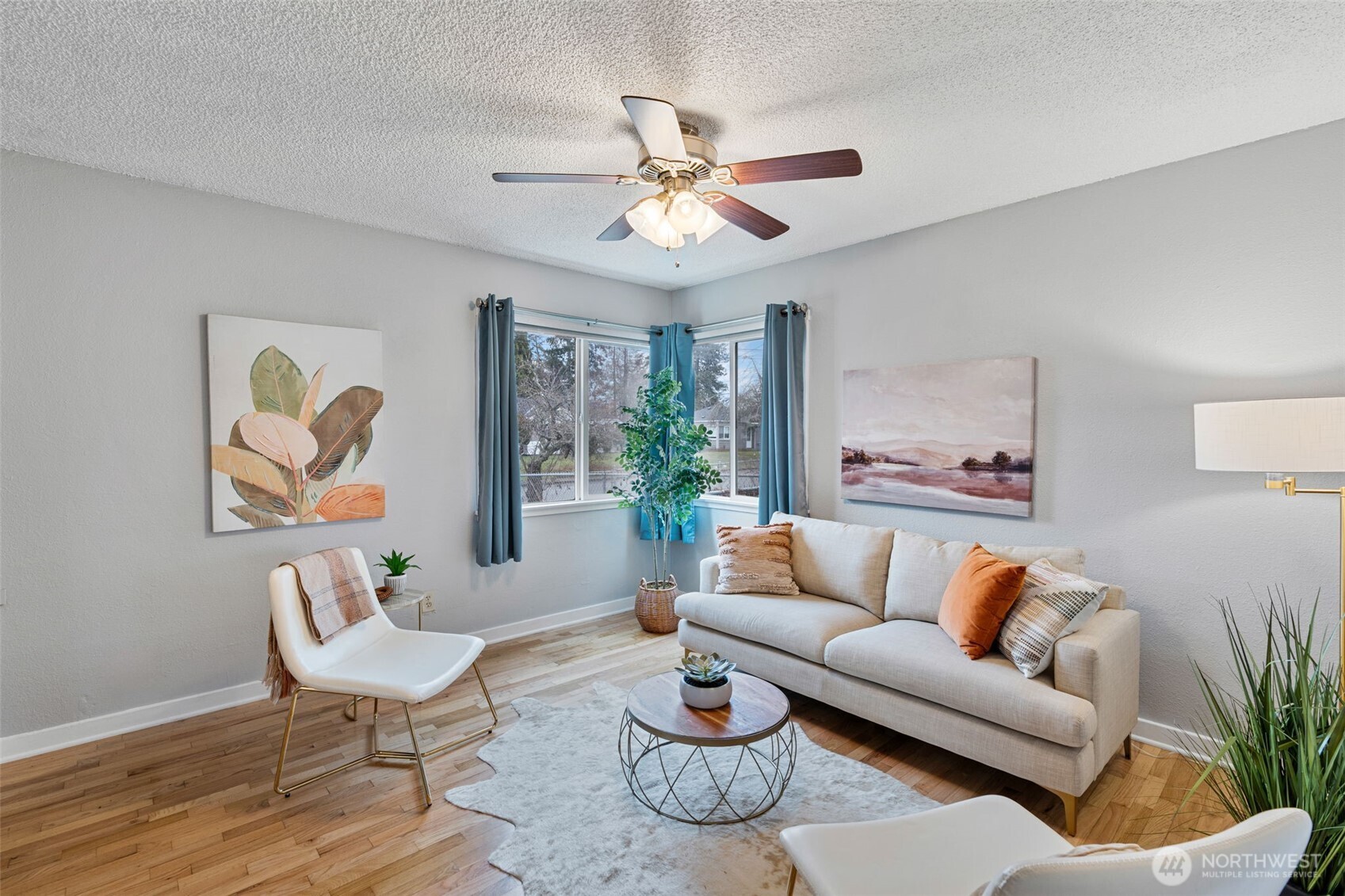 1027 South Rochester Street Tacoma, WA 98465 - Photo 7 of 29 a living room with furniture and a large window