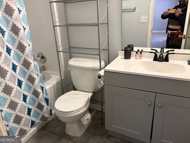 10725 Barberry Drive Hampton, GA 30228 - Photo 18 of 18 a bathroom with a sink a toilet and a mirror