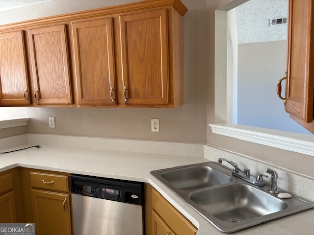 10725 Barberry Drive Hampton, GA 30228 - Photo 8 of 18 a kitchen with a sink cabinets and a wooden floor