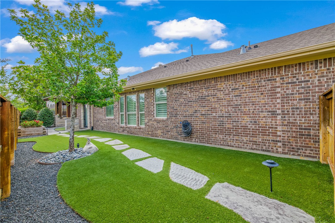 4001 Dunlap Loop College Station, TX 77845 - Photo 45 of 50 a view of a backyard with a garden