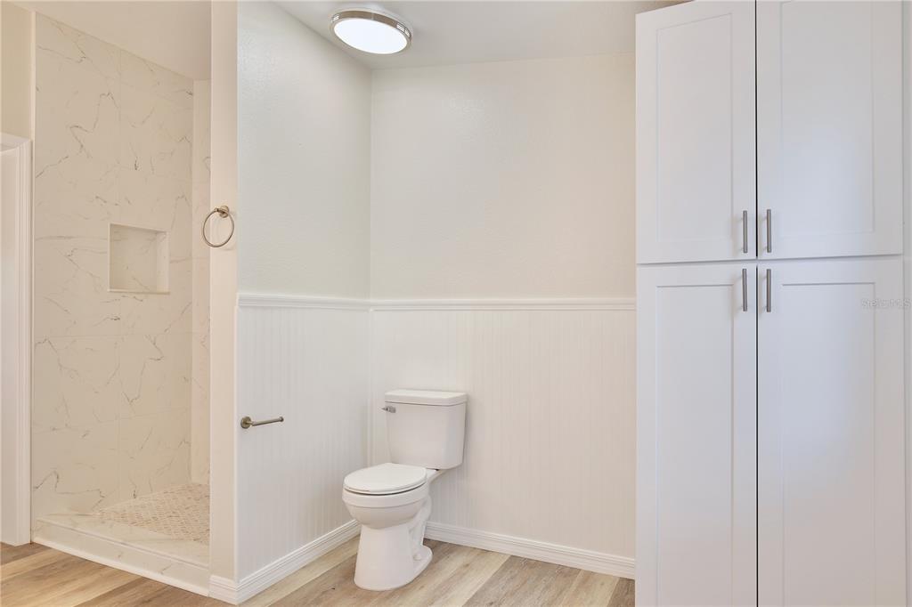 15330 Apache Pass Eustis, FL 32726 - Photo 23 of 44 a bathroom with a toilet and a shower