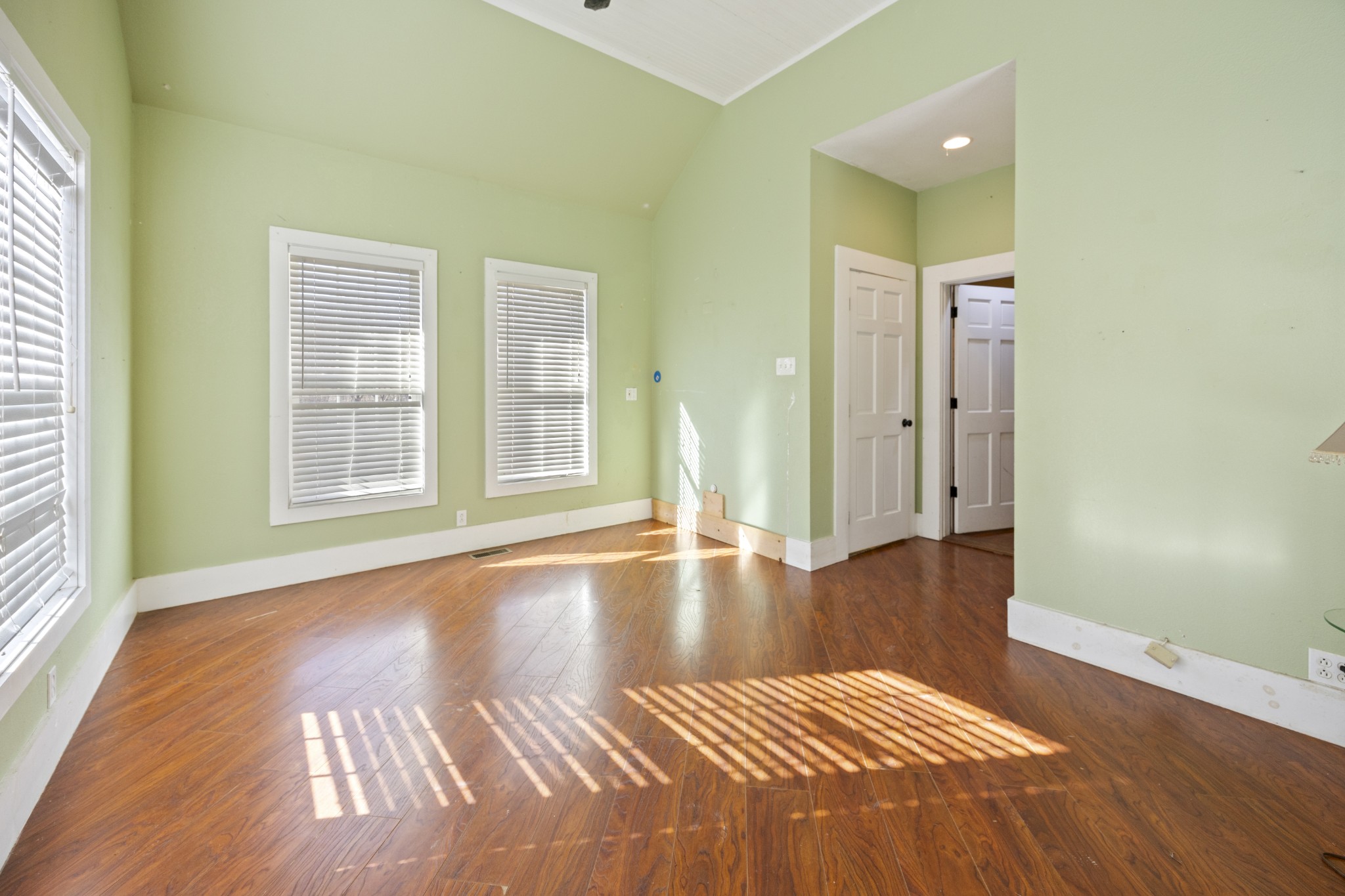 801 South High Street Winchester, TN 37398 - Photo 17 of 49 a view of an empty room with window and wooden floor