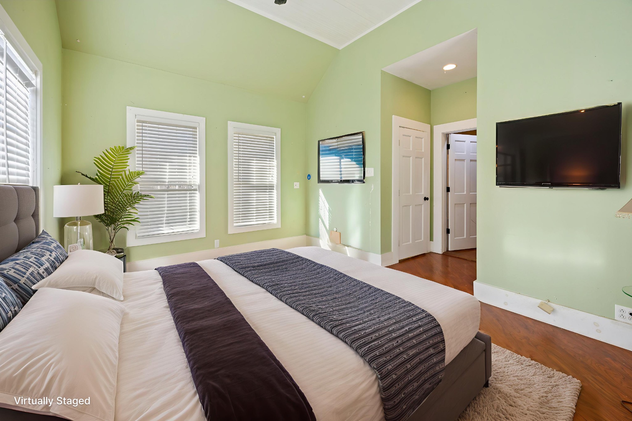 801 South High Street Winchester, TN 37398 - Photo 19 of 49 a bedroom with a bed and a flat screen tv