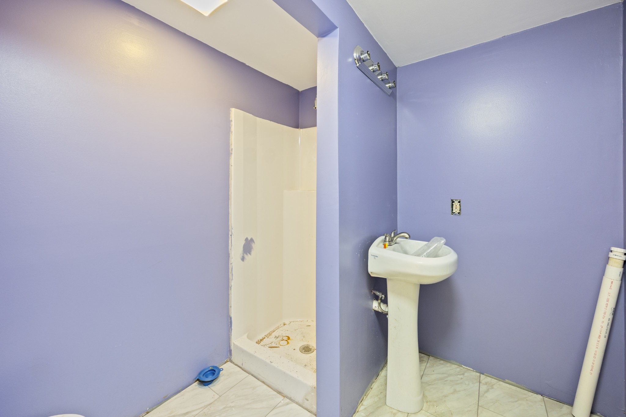 801 South High Street Winchester, TN 37398 - Photo 32 of 49 a bathroom with a sink a toilet and shower