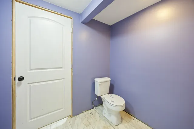 a bathroom with a toilet