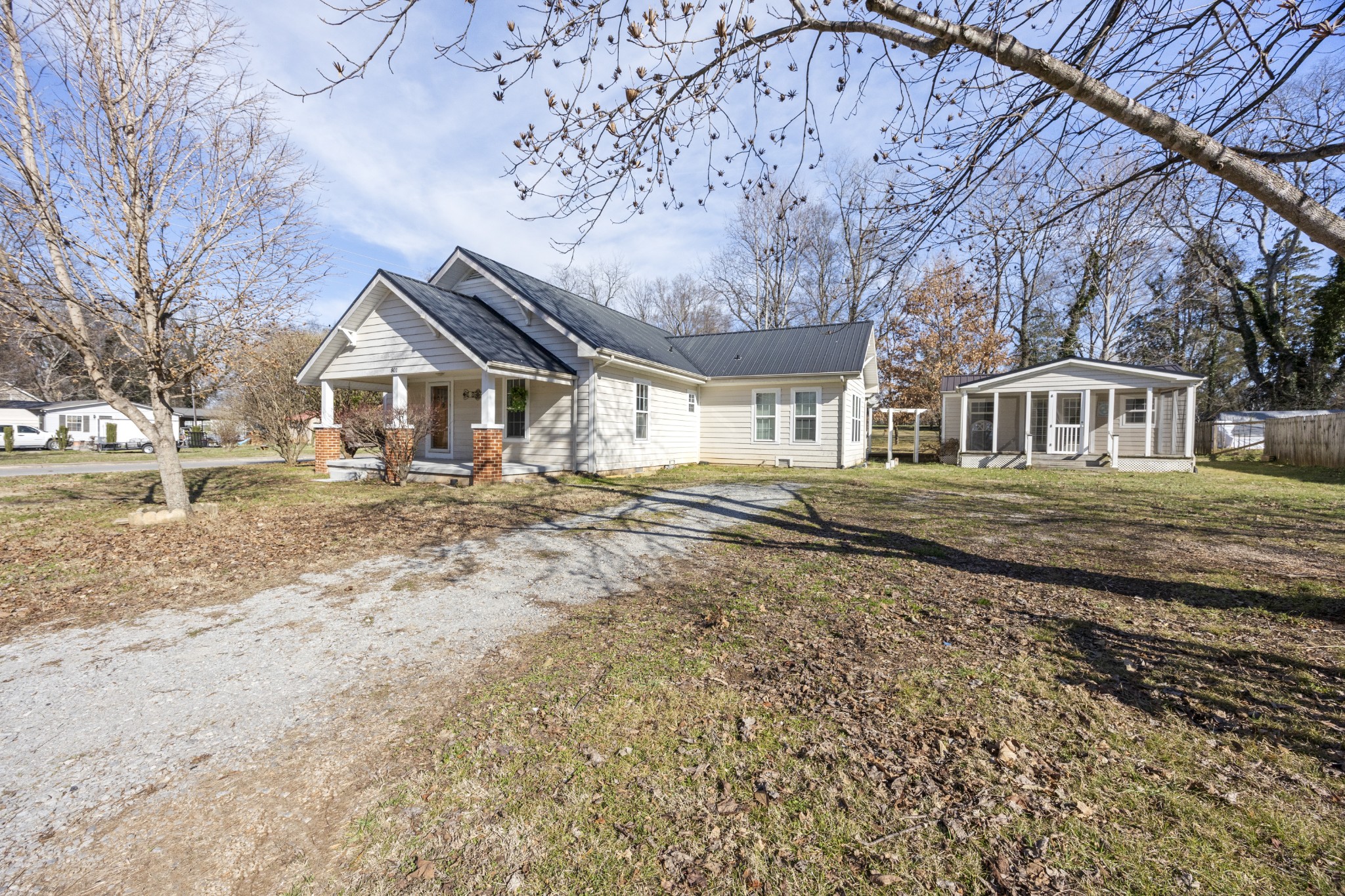 801 South High Street Winchester, TN 37398 - Photo 36 of 49 a front view of a house with a yard