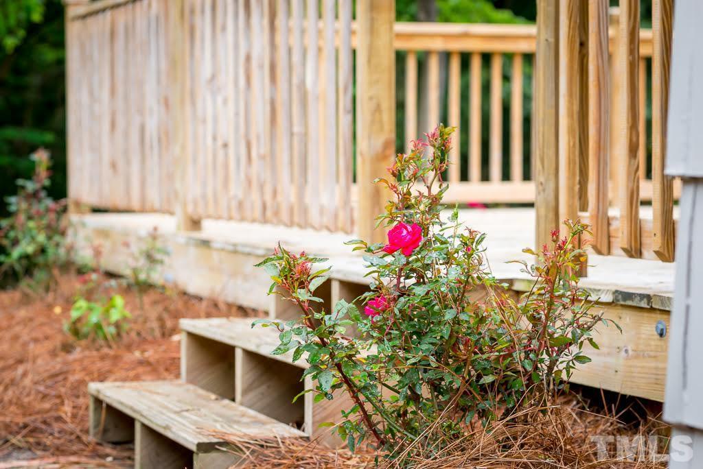 4220 Rowan Street Raleigh, NC 27609 - Photo 20 of 24 a front view of a house with a yard
