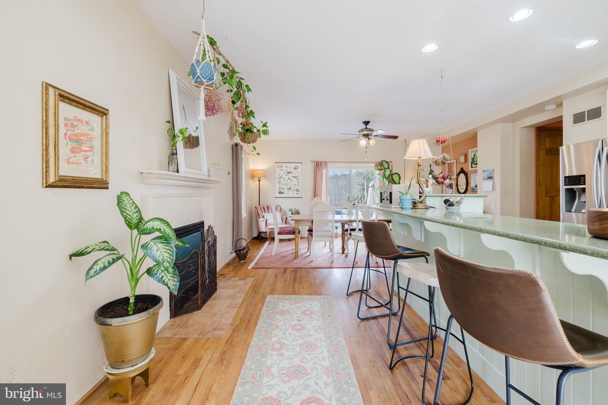 1568 Deer Creek Road New Freedom, PA 17349 - Photo 12 of 90 Wood burning fireplace in the kitchen/DR area