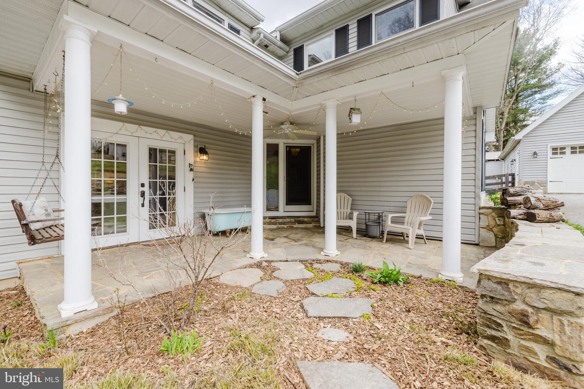 1568 Deer Creek Road New Freedom, PA 17349 - Photo 8 of 90 Walk up to the wonderful stone porch