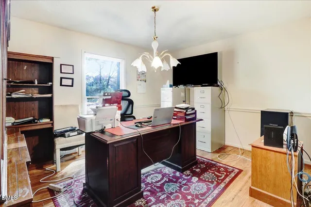 a room with furniture and a flat screen tv