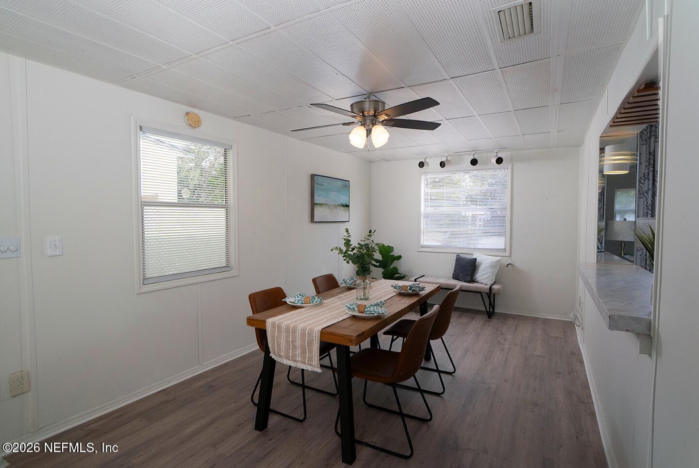 10250 Briarcliff Road East Jacksonville, FL 32218 - Photo 11 of 24 a view of a dining room with furniture and a window