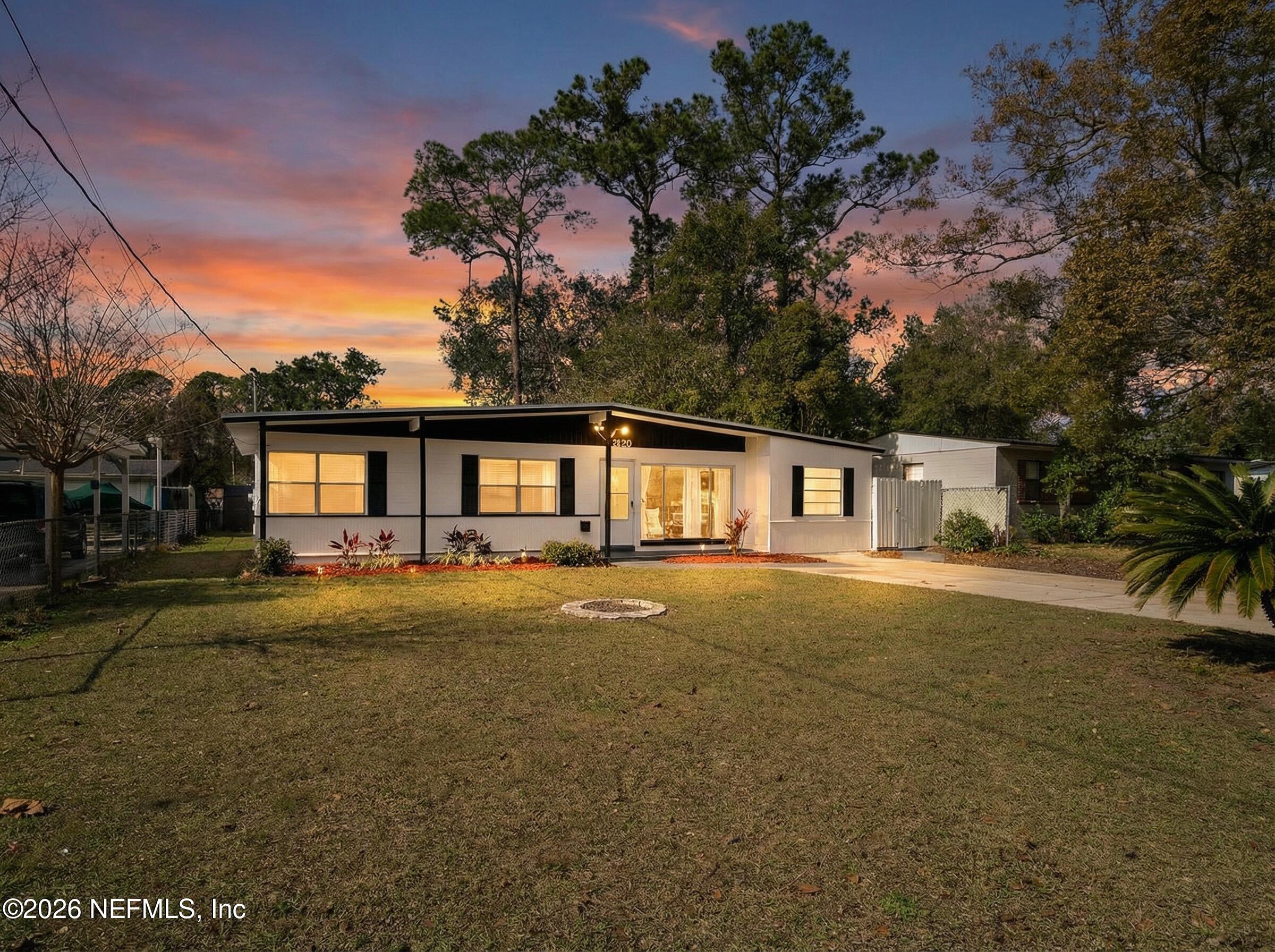 10250 Briarcliff Road East Jacksonville, FL 32218 - Photo 8 of 24 a front view of a house with a yard