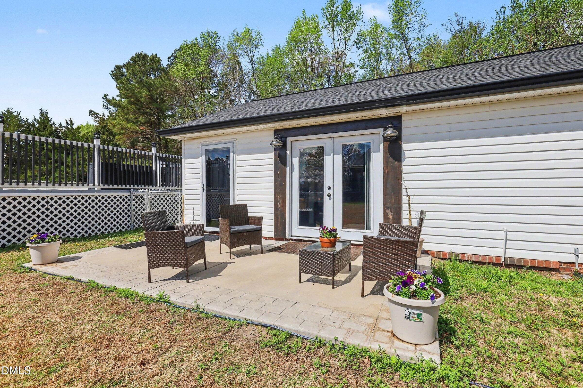 430 Fred Hall Road Stedman, NC 28391 - Photo 59 of 63 a front view of a house with patio