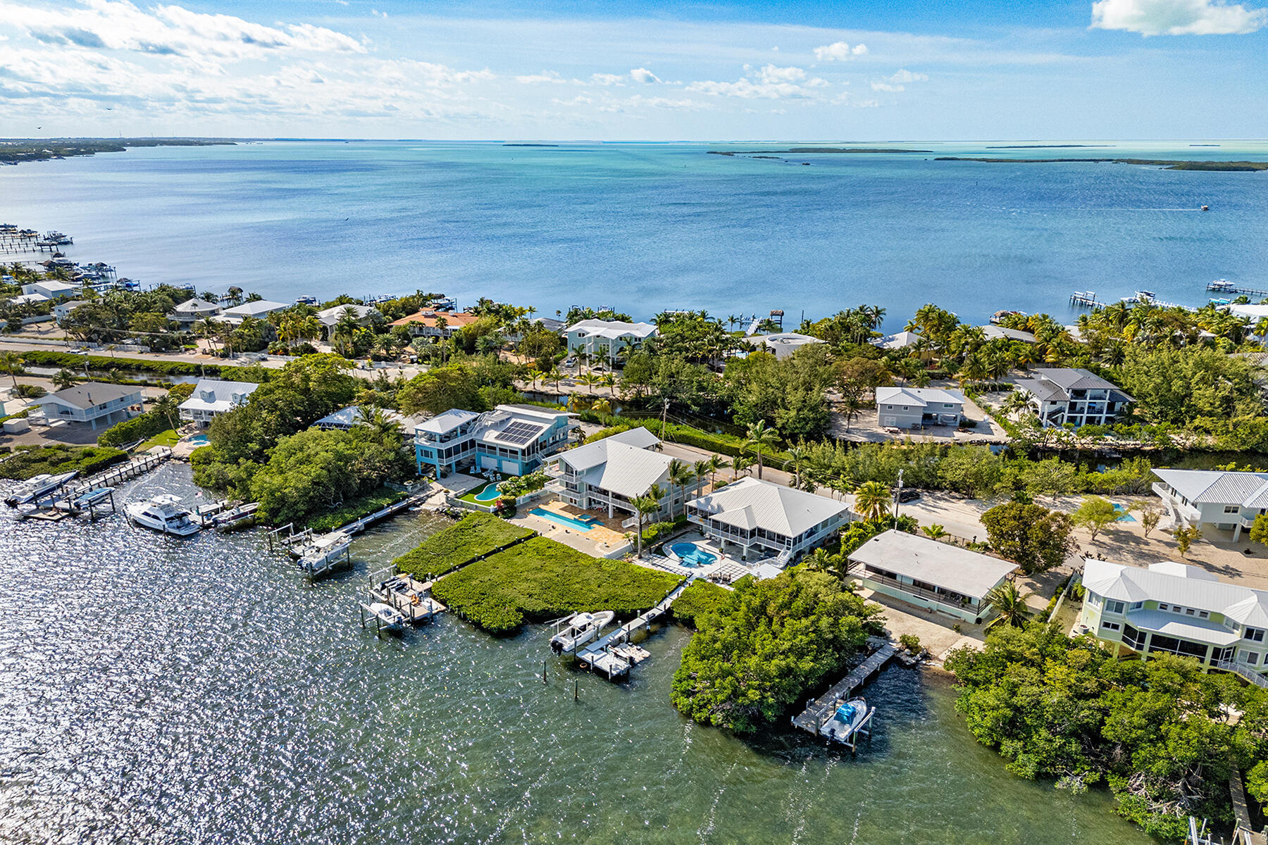 an aerial view of a houses with outdoor space